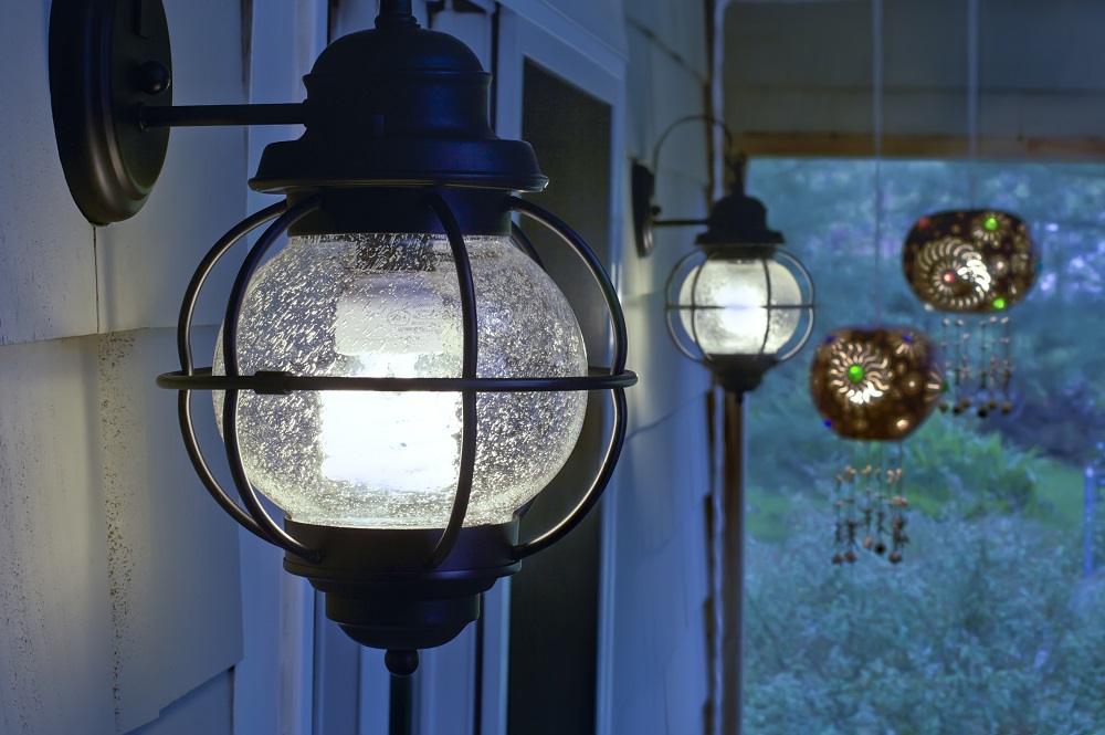 How to Stage Your Front Porch for Maximum Curb Appeal - Upgrade Lighting